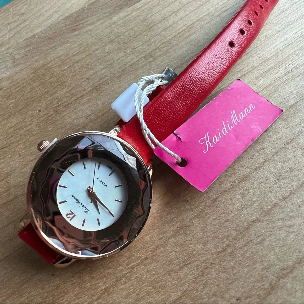 Kaidi Mann ladies rose gold tone red watch NEW BATTERY